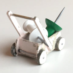 Doll's pushchair with pins by Stafford Allpress